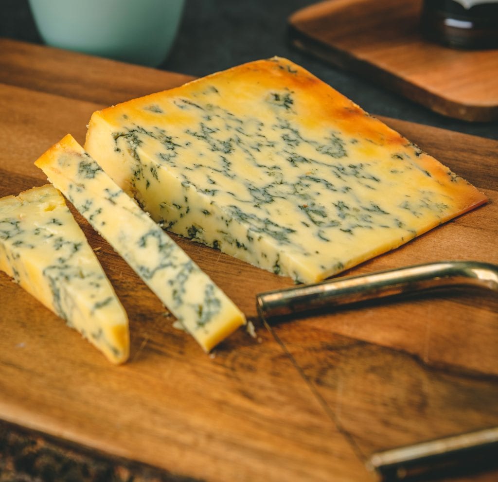 https://rustickitchendeli.com/collections/british-cheeses/products/feast-and-furious-oak-beech-wood-smoked-stilton-cheese