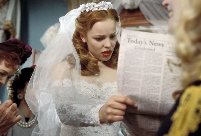 Bride Looking at Newspaper