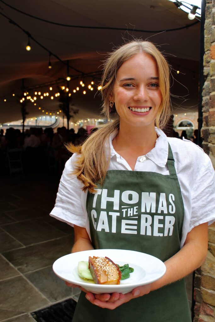Staff Proudly Displaying Food